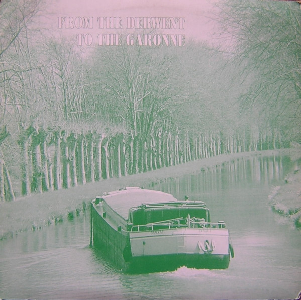 Cover of From the Derwent to the Garonne, A Derbian Compilation. It features a green on white monochromatic photograph of a ferry making its way downstream, with the title of the record above it.