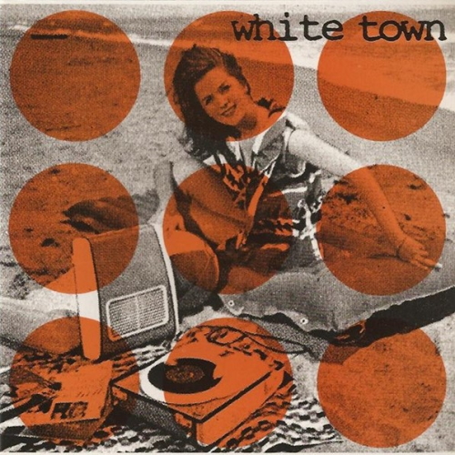 Cover of White Town's Fairweather Friend EP. It consists of a black and white photo of a lady sitting in a park with a smile on her face, overlayed with the band and EP names on opposite corners. There is a 3x3 grid of orange circles on top of the photo as part of the cover's design.