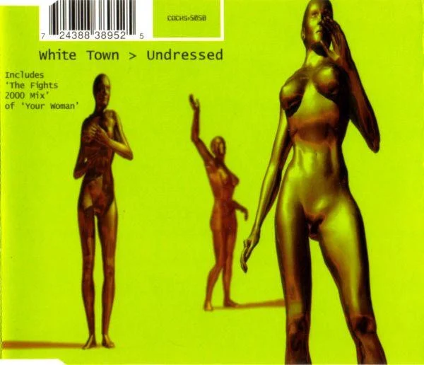 Cover of Undressed CD1. Green background. Three poorly rendered 3D metallic naked women are positioned posing throughout the main frame of the cover. On the top left corner, the barcode and the catalogue number. Below that, the text 'White Town > Undressed'. Below and to the side, the flavor text 'Includes The Flights 2000 Mix of Your Woman'.