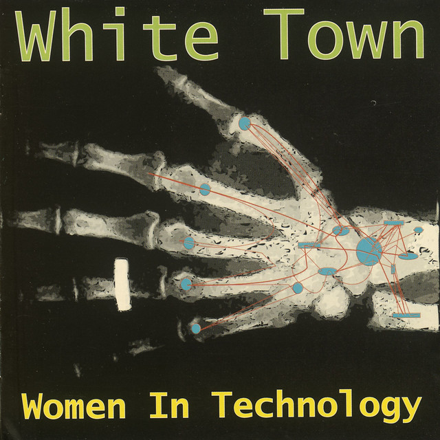 Cover of Women in Technology. Black background. At the top of the cover, the name of the band, 'White Town', in green. Below that, an x-ray of a human hand with a ring and digitally added blue nodes connected by red lines. At the bottom, the name of the album 'Women in Technology'.